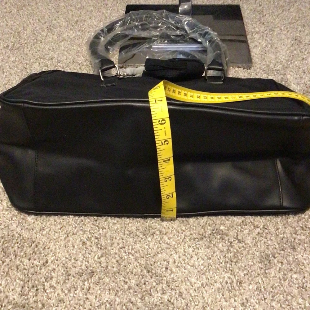 New Calvin Klein Elegant Black canvas and leather Duffel Bag